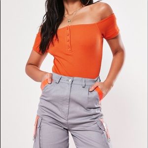 Orange off shoulder bodysuit fits large